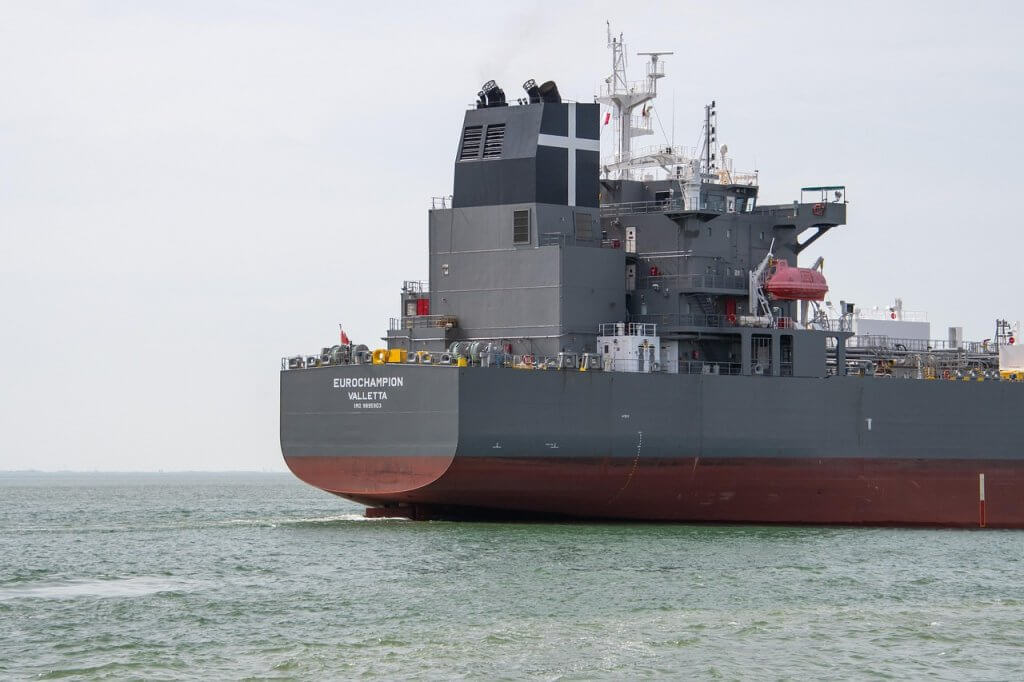 The stern of the cargo ship Eurochampion, registered in Valletta, sailing on open water.